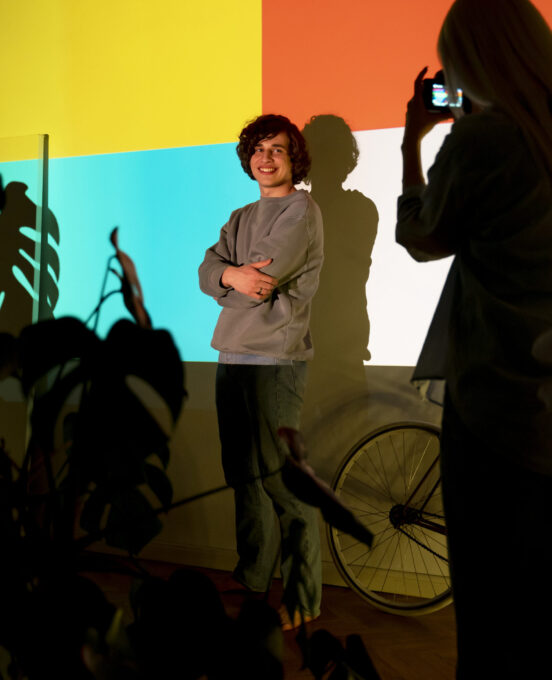 couple-taking-photos-light-movie-projector