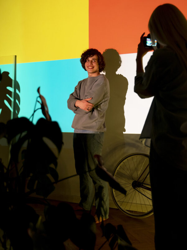 couple-taking-photos-light-movie-projector