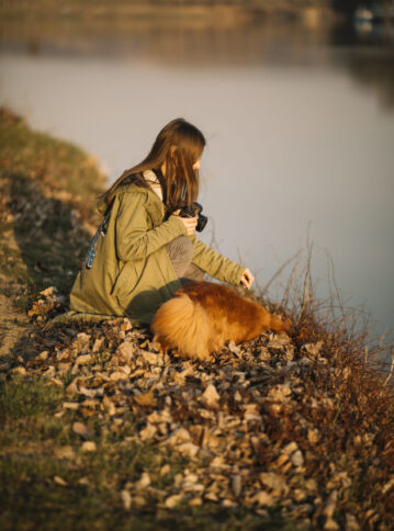 full-shot-woman-holding-camera