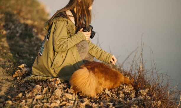 full-shot-woman-holding-camera