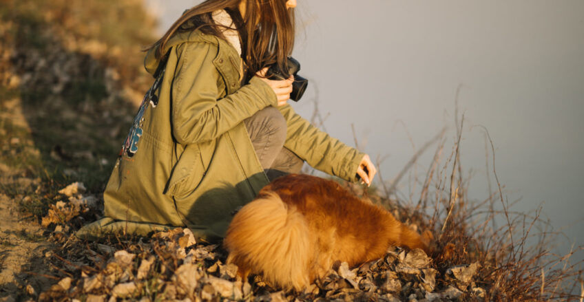 full-shot-woman-holding-camera