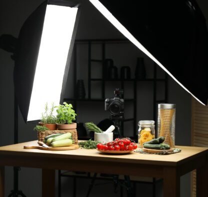 Shooting food in photo studio with professional lighting equipment