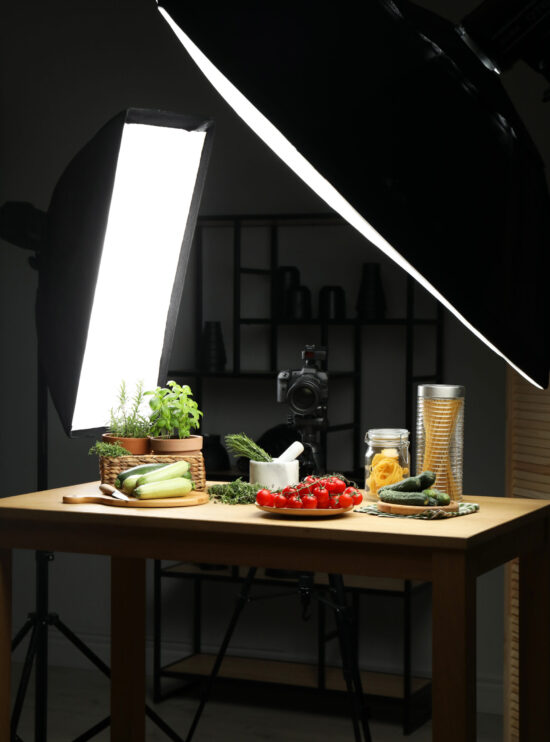 Shooting food in photo studio with professional lighting equipment
